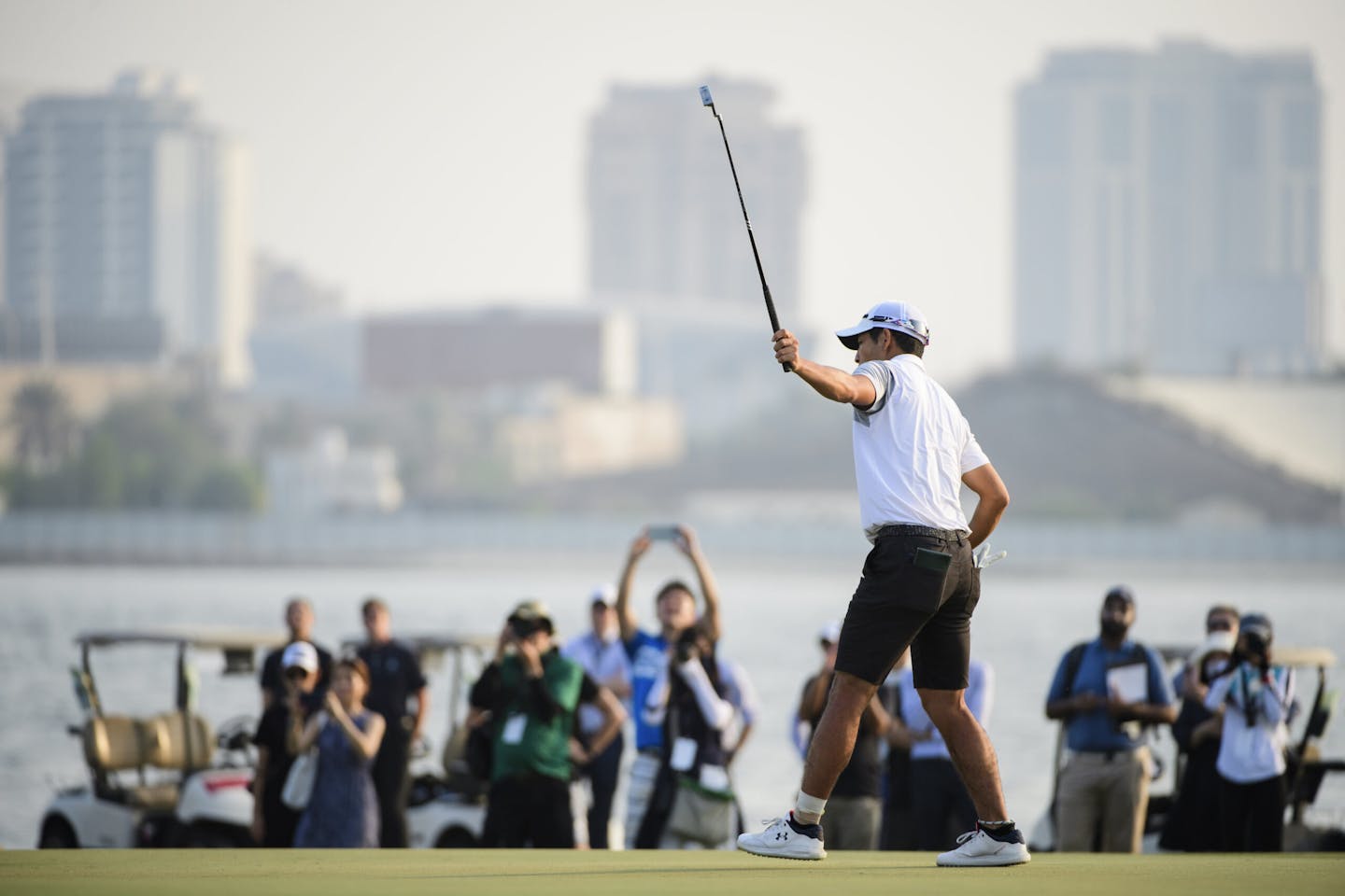 Keita Nakajima of Japan celebrates on the 18th green after winning on the second playoff hole during round 4