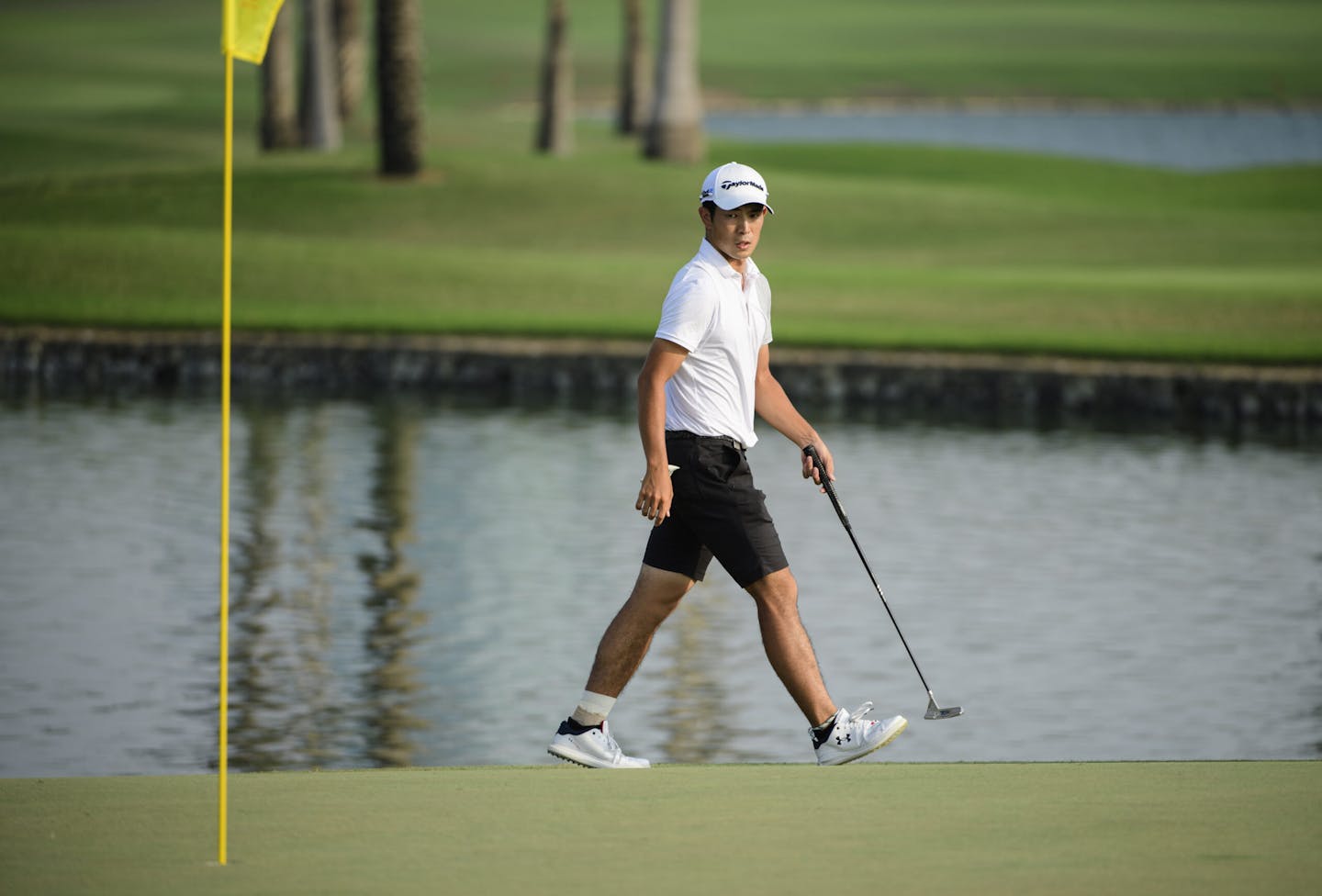 Keita Nakajima of Japan lines up a putt on the 18th tee during round 4