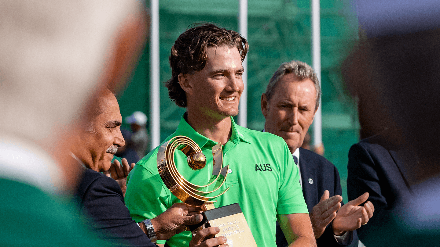 Jasper Stubbs lifts the AAC Trophy