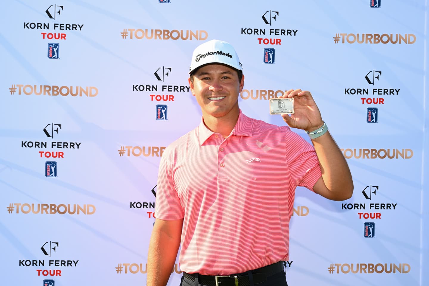 Karl Vilips poses with his TOUR card during the final round of the Korn Ferry Tour Championship