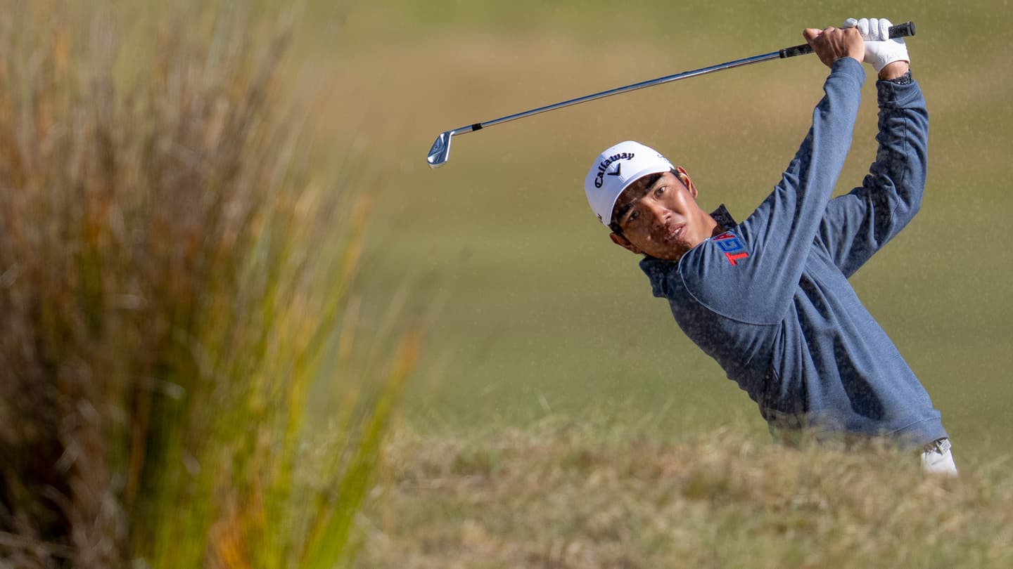Fifa Laopakdee of Thailand plays an approach stroke on the No. 18 hole