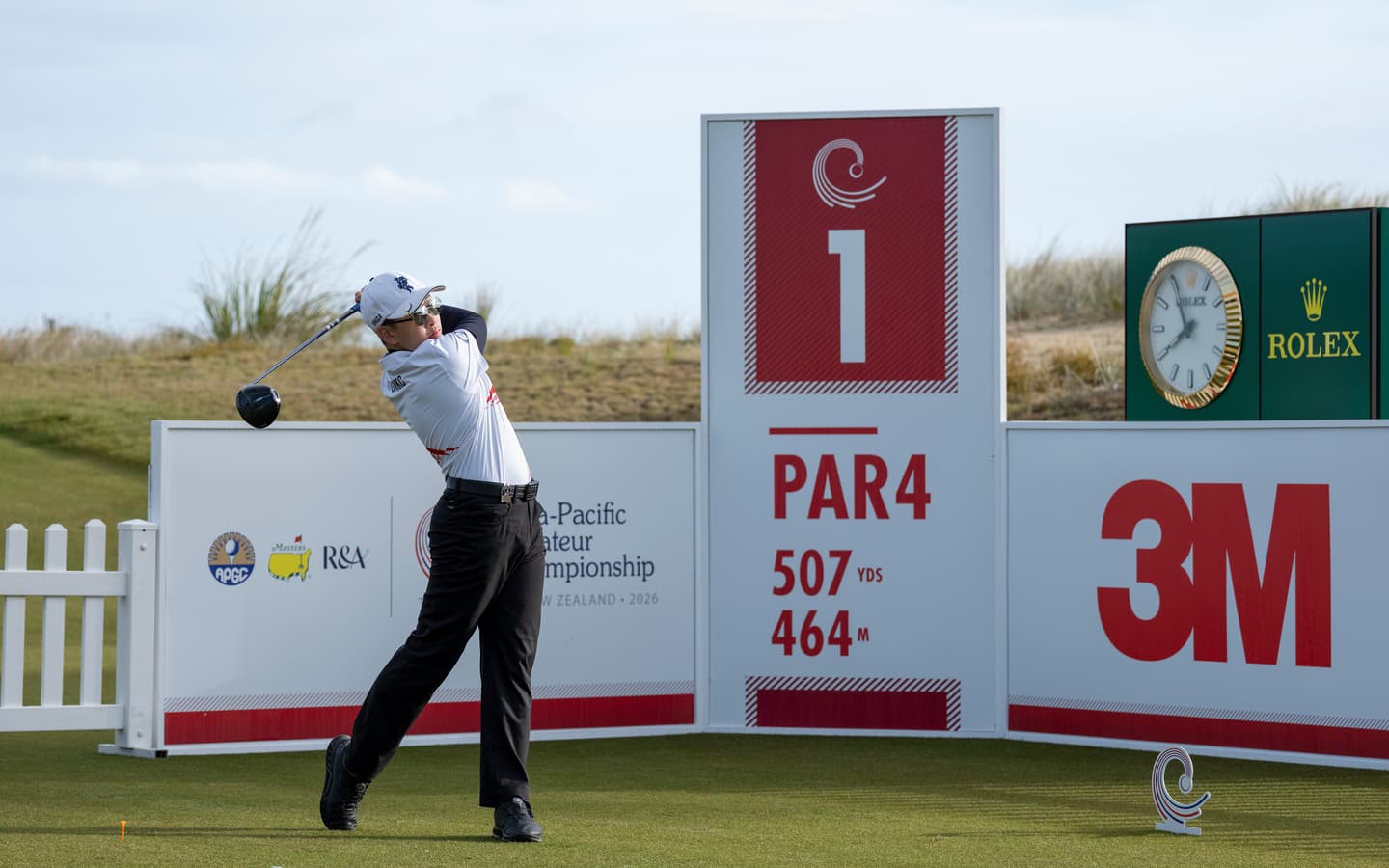 Joseph Cao of Hong Kong, China plays his stroke from the No. 1 tee