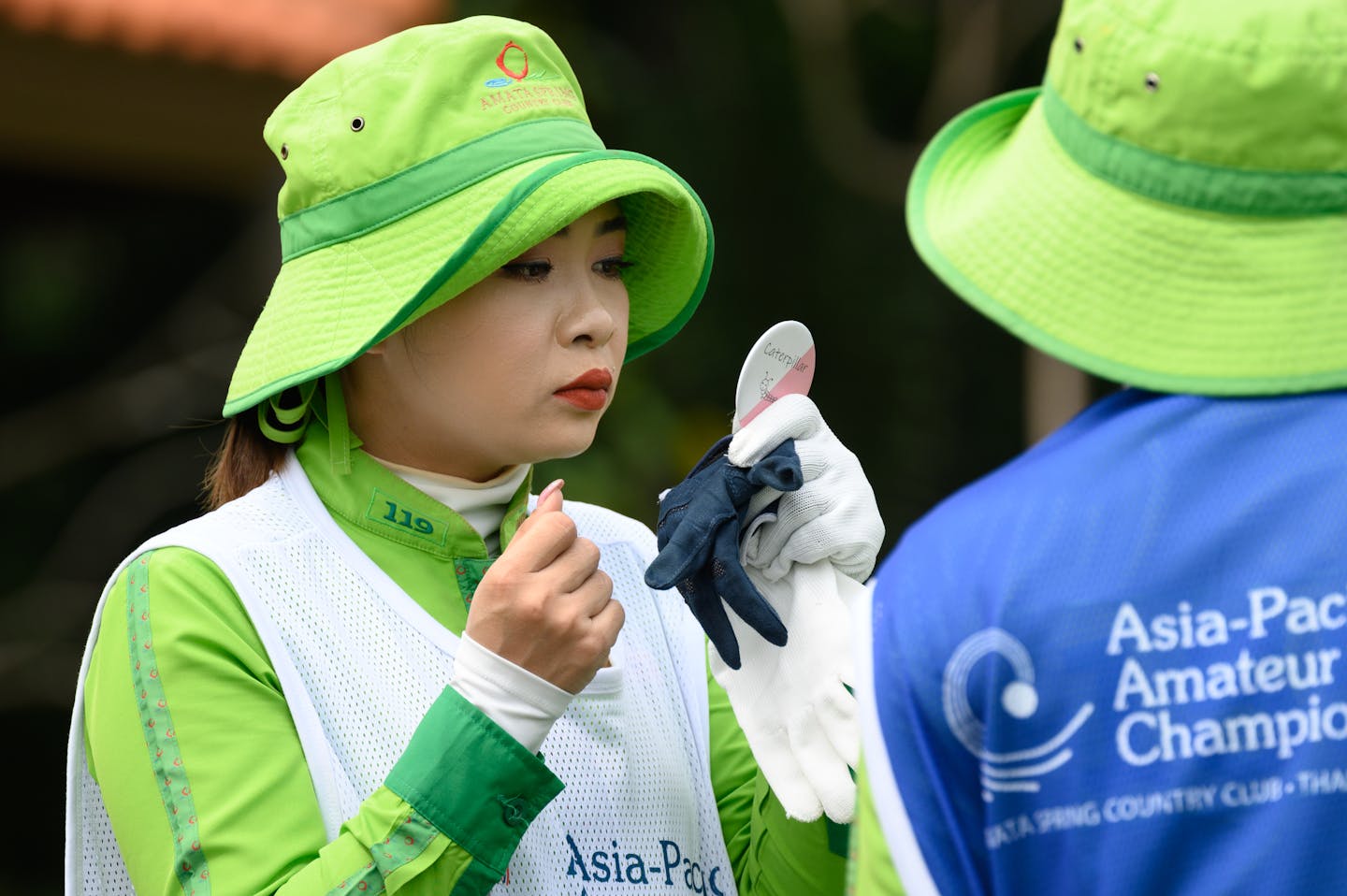 A caddie during Round 1 at AAC 2022